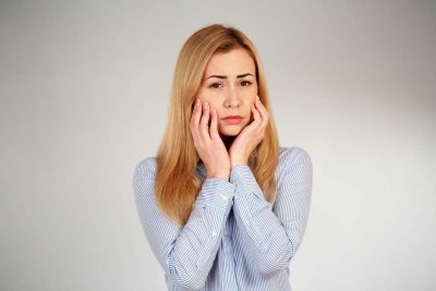 4 momentos onde a alteração hormonal afeta saúde bucal